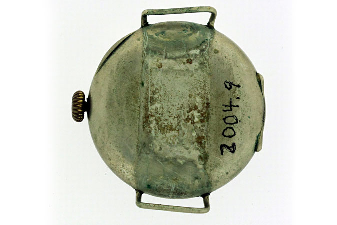 rear view of Beamish's wristwatch with the track mark, '2004.9' written on back case.