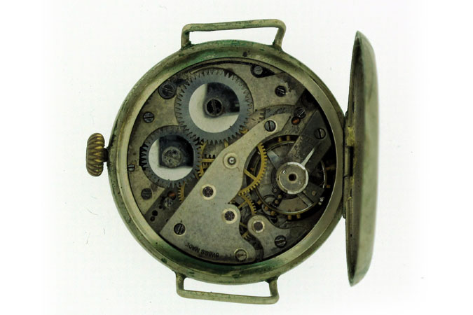case opened with view of exposed movement of Beamish's watch.