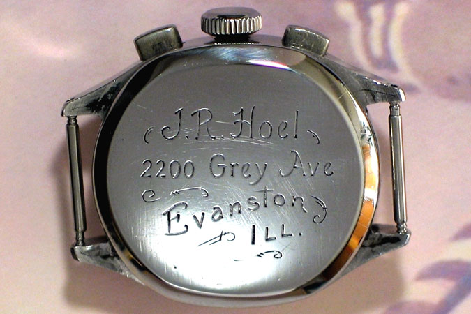photograph of the back of Jim Hoel's chronograph. Engraving revealed: J.R. Hoel, 2200 Grey Ave. Evanston ILL.